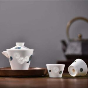 White porcelain three pieces drinkware set for traveller
