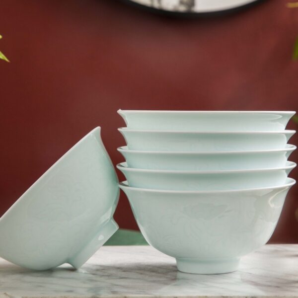 Bluish White porcelain bowl engraved with flowers