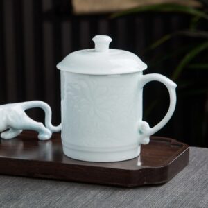 Bluish White porcelain lidded mug engraved with bamboo and lotus