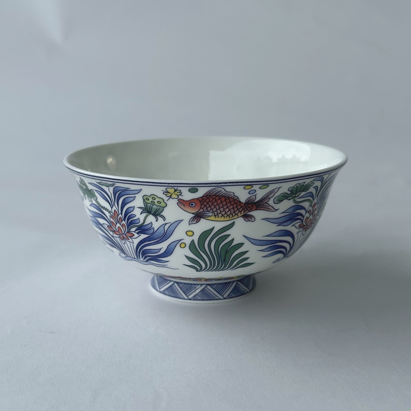 Ceramic bowl with enamel painting in an oceanic theme