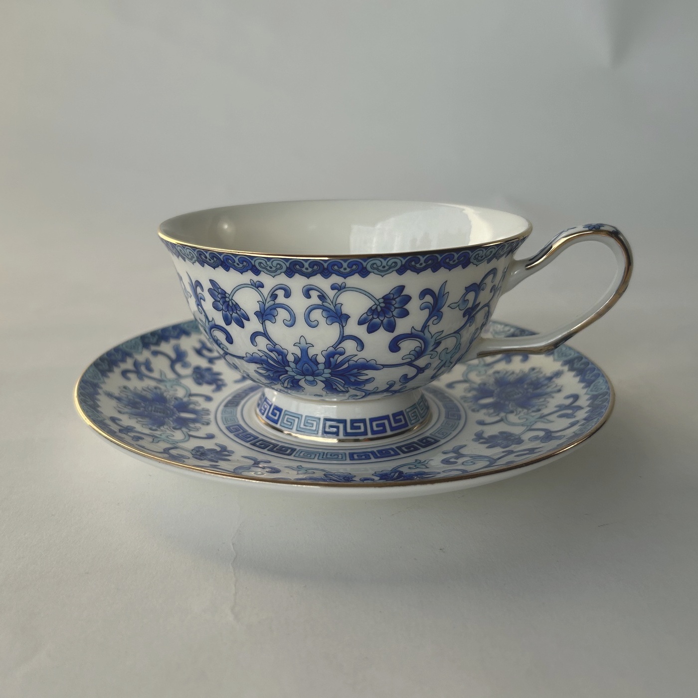 Ceramic Coffee Cup and saucer -Blue and white Twining branches