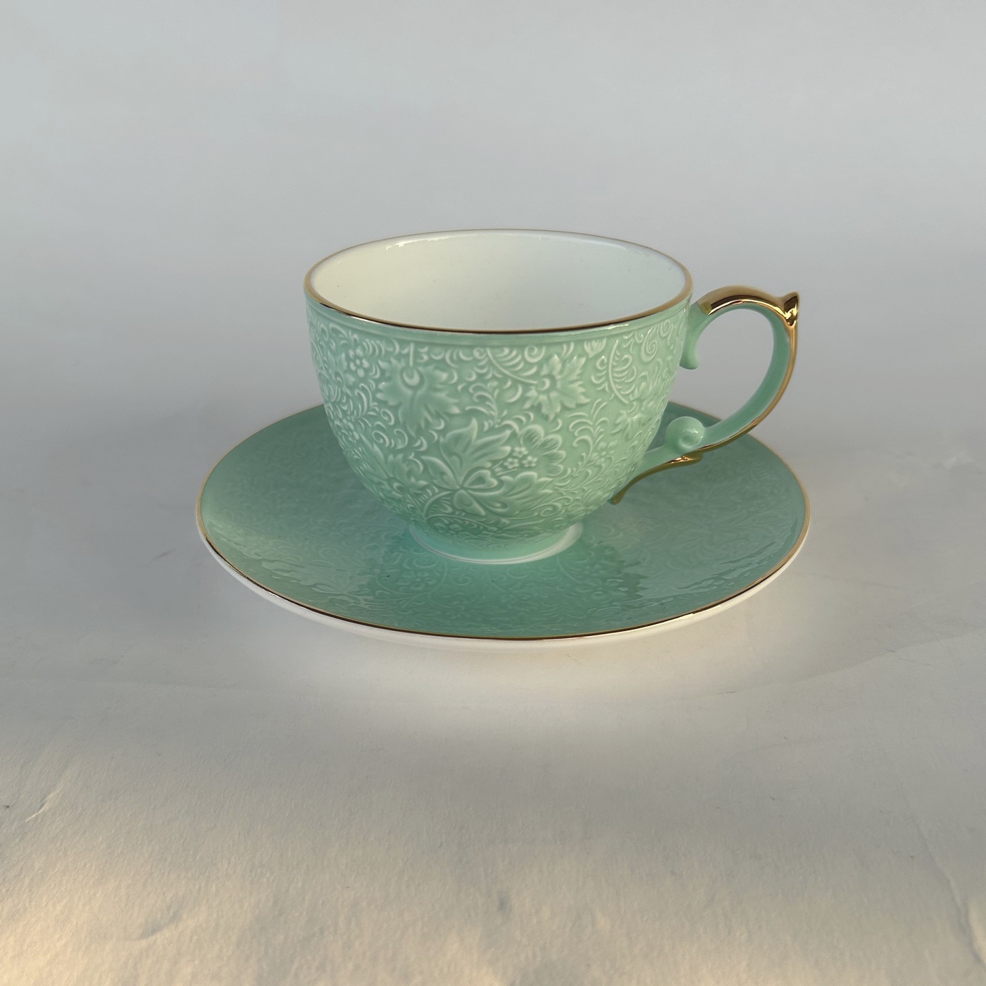 Ceramic coffee cups- dual cups and saucers with gold handle and trim