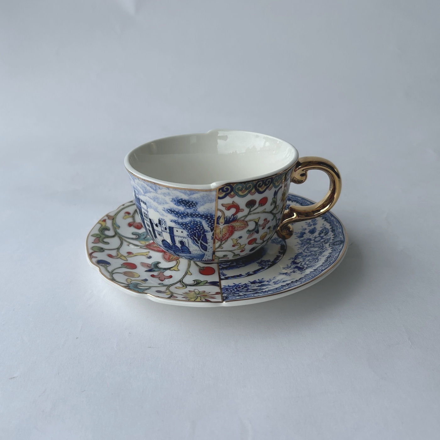 Ceramic Coffee Cup and saucer blue and white mixed flora